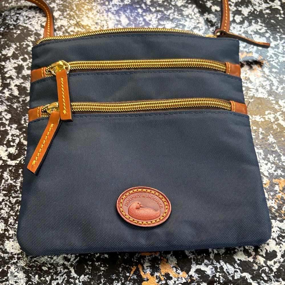 Dooney & Bourke Nylon North South triple zipNavy Crossbody with Tan Leather Trim